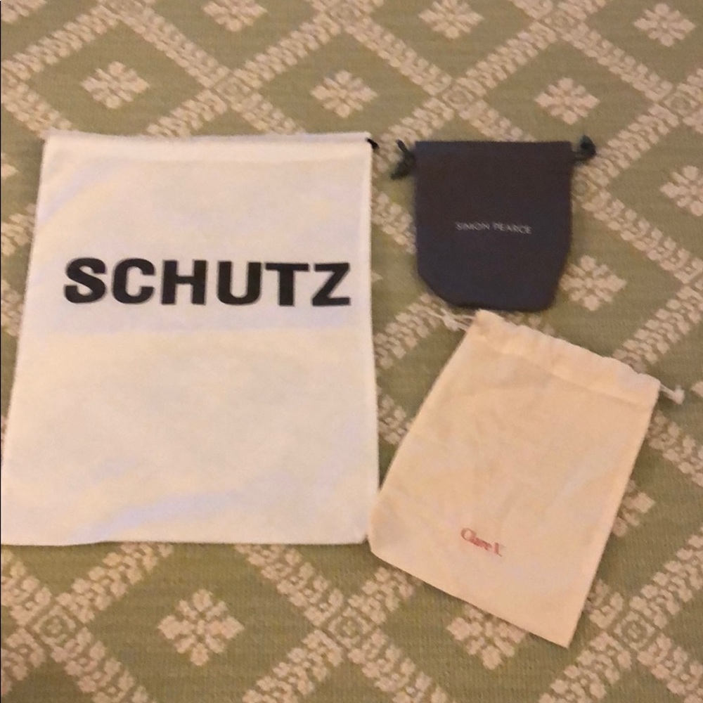 Array of dust bags - schutz Simon Pearce & Clare V